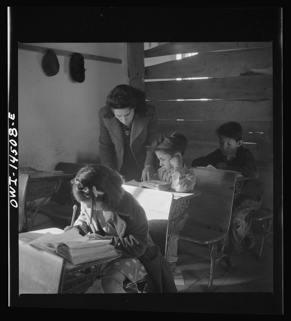 Ojo Sarco, New Mexico. One-room school in an isolated mountainous Spanish-American community, which has eight grades and two…