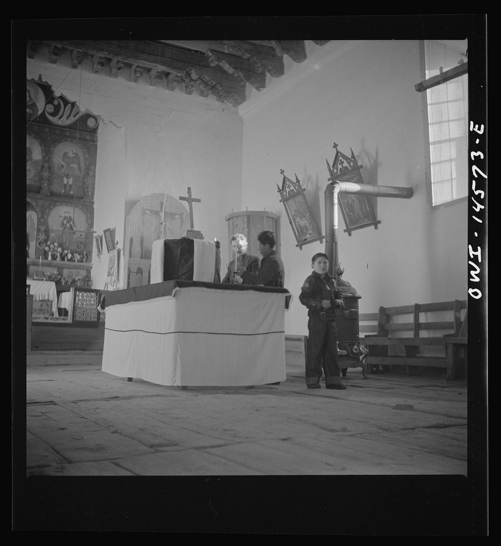 [Untitled photo, possibly related to: Trampas, New Mexico. Main altar in a church which was built in 1700 and is the best…