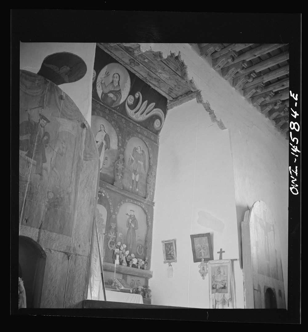 [Untitled photo, possibly related to: Trampas, New Mexico. Main altar in a church which was built in 1700 and is the best…