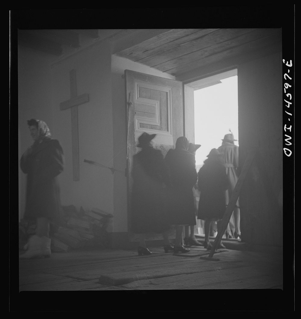 [Untitled photo, possibly related to: Trampas, New Mexico. People leaving the church after the service]. Sourced from the…