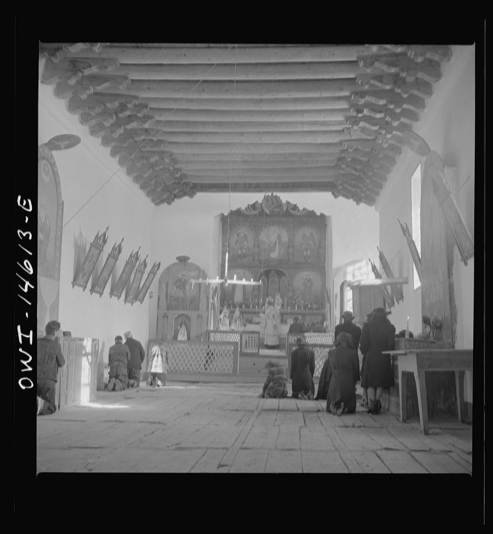 Trampas, New Mexico. Father Cassidy conducting mass at a church which was built in 1700 and is the best-preserved colonial…