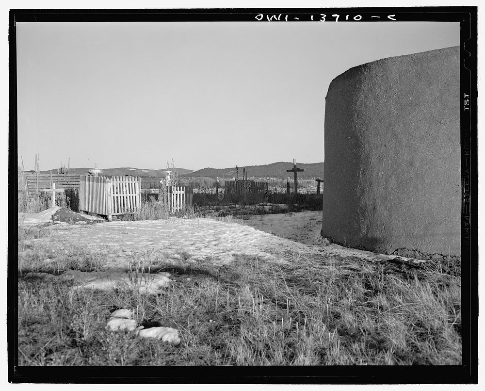 Llano, near Penasco, New Mexico. The graveyard behind the church of Penitente Miranda. Sourced from the Library of Congress.