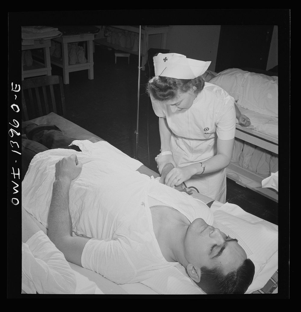 New York, New York. Italian-American fireman giving pint of blood to the Red Cross. Sourced from the Library of Congress.