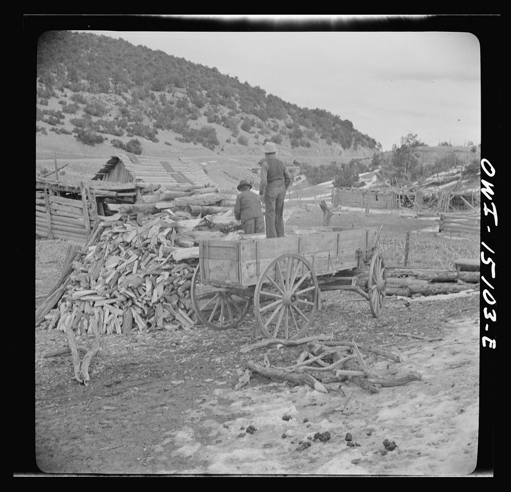 [Untitled photo, possibly related to: Trampas, New Mexico. Juan Lopez, the majordomo (mayor), and his son arriving home with…