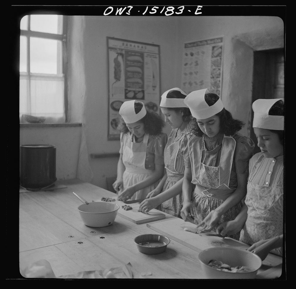 [Untitled photo, possibly related to: Penasco, New Mexico. A domestic science class in the high school]. Sourced from the…