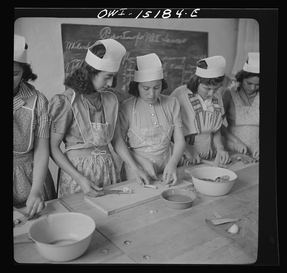 Penasco, New Mexico. A domestic science class in the high school. Sourced from the Library of Congress.