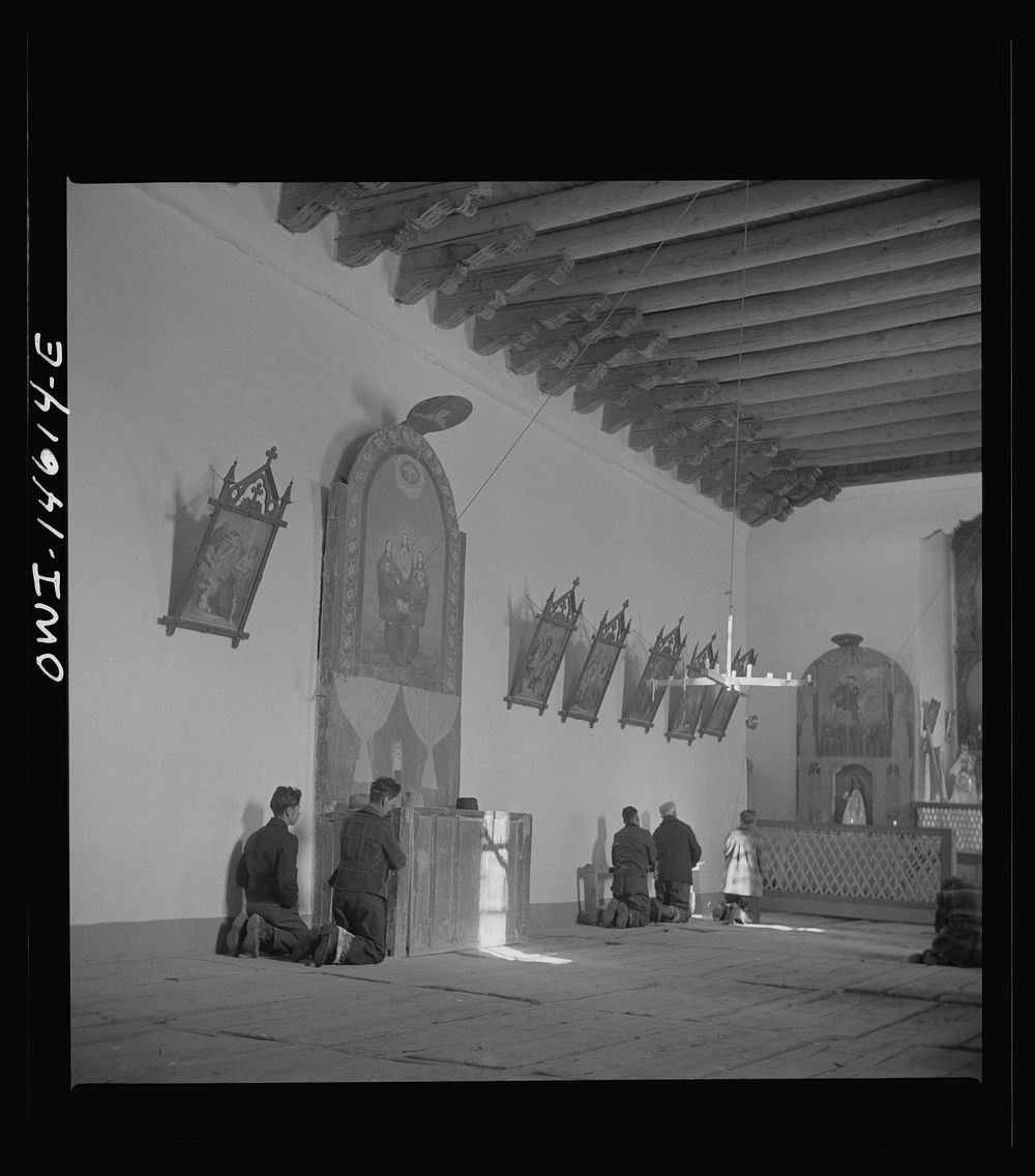 Trampas, New Mexico. Father Cassidy conducting mass at a church which was built in 1700 and is the best-preserved colonial…