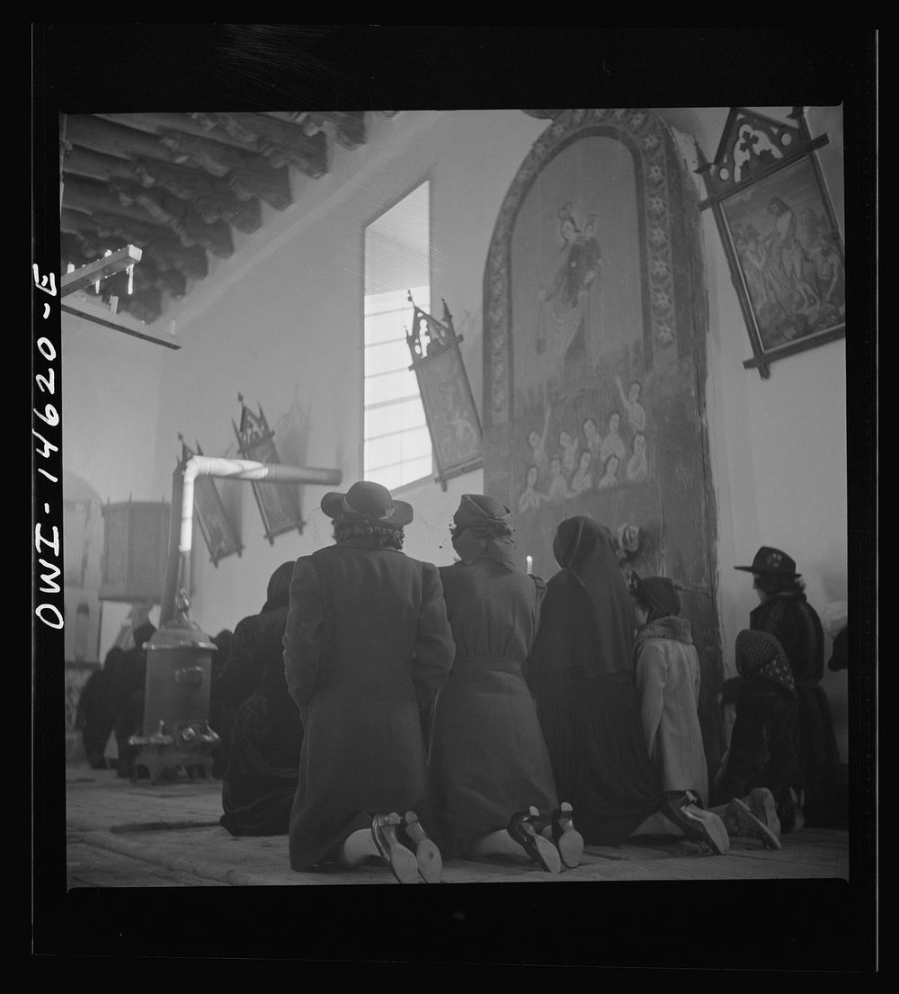 [Untitled photo, possibly related to: Trampas, New Mexico. Service at the mission church. The painting on the retablo…