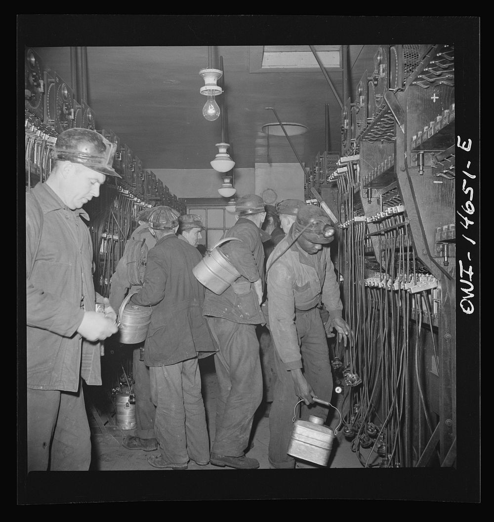 Pittsburgh (vicinity), Pennsylvania. Montour Number Four mine of the Pittsburgh Coal Company. Miners in the room where lamps…