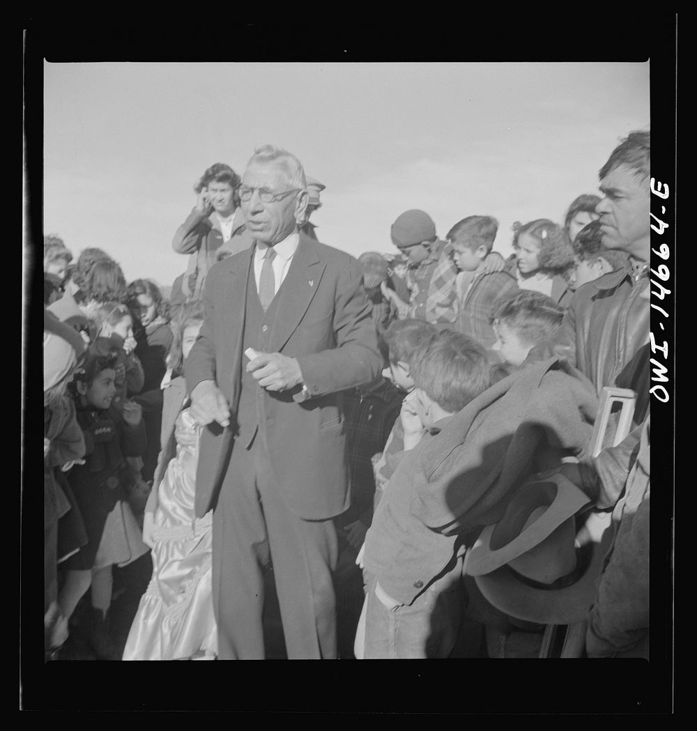 [Untitled photo, possibly related to: Penasco, New Mexico. Justice of the peace making a speech "in the grand manner" at the…