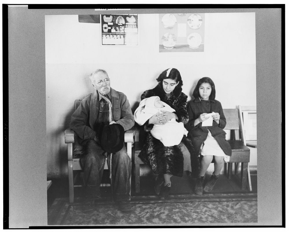 Penasco, New Mexico. Waiting room of the clinic operated by the Taos County cooperative health association on well baby day.…