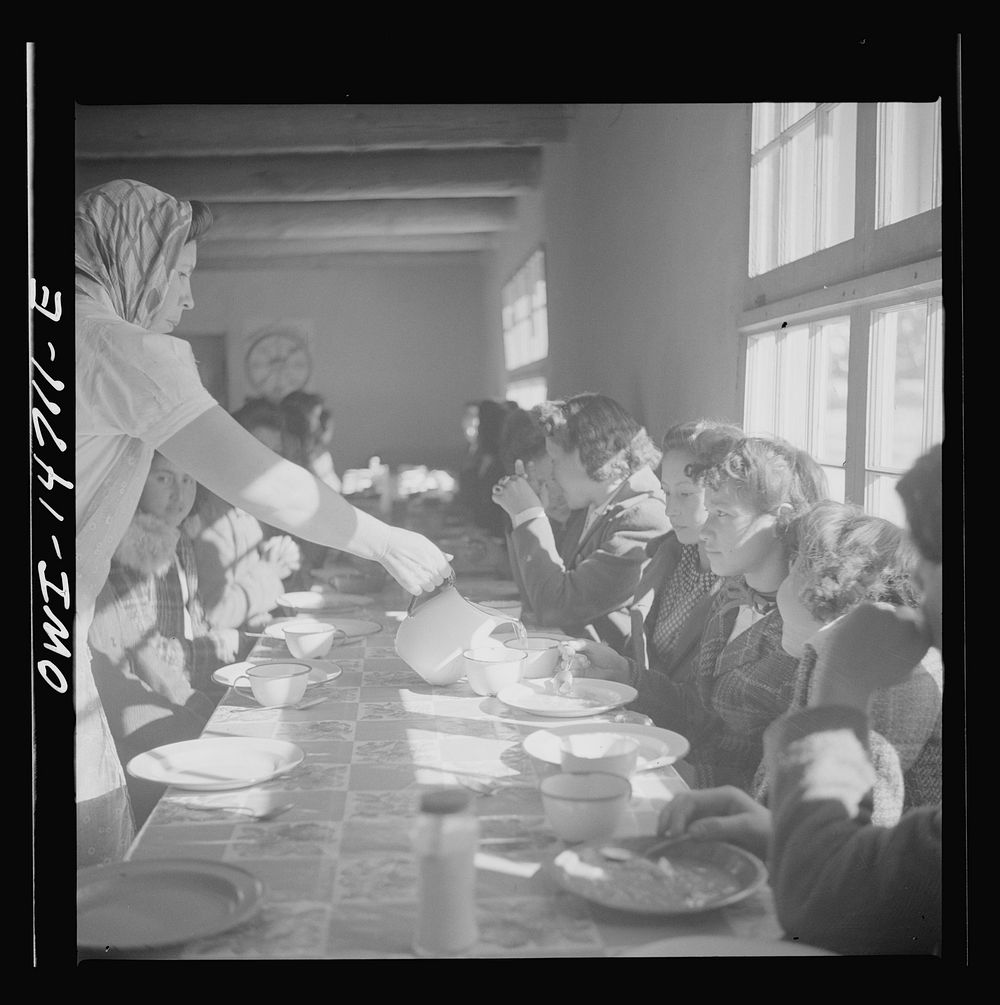 Penasco, New Mexico. Hot lunch provided by community support at a grade and high school administered by the Roman Catholic…