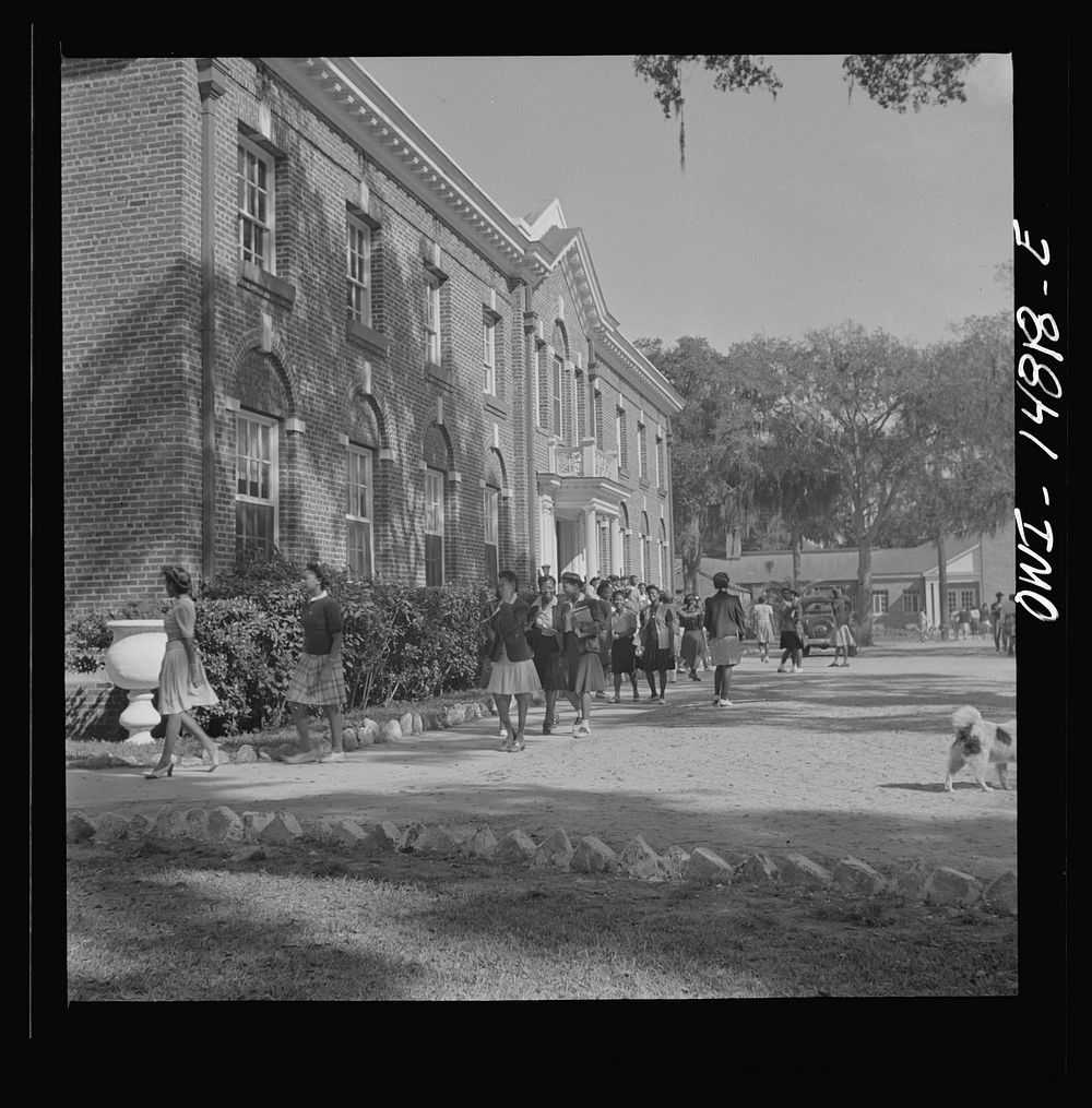 Daytona Beach, Florida. Bethune-Cookman College. Students leaving the White Hall building. Sourced from the Library of…