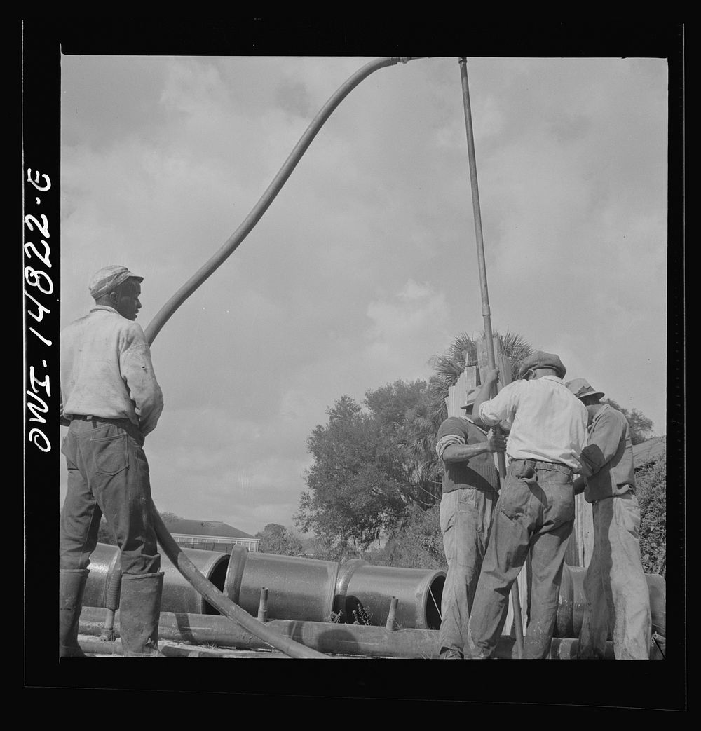 Daytona Beach, Florida.  laborers laying sewer pipeline. Sourced from the Library of Congress.