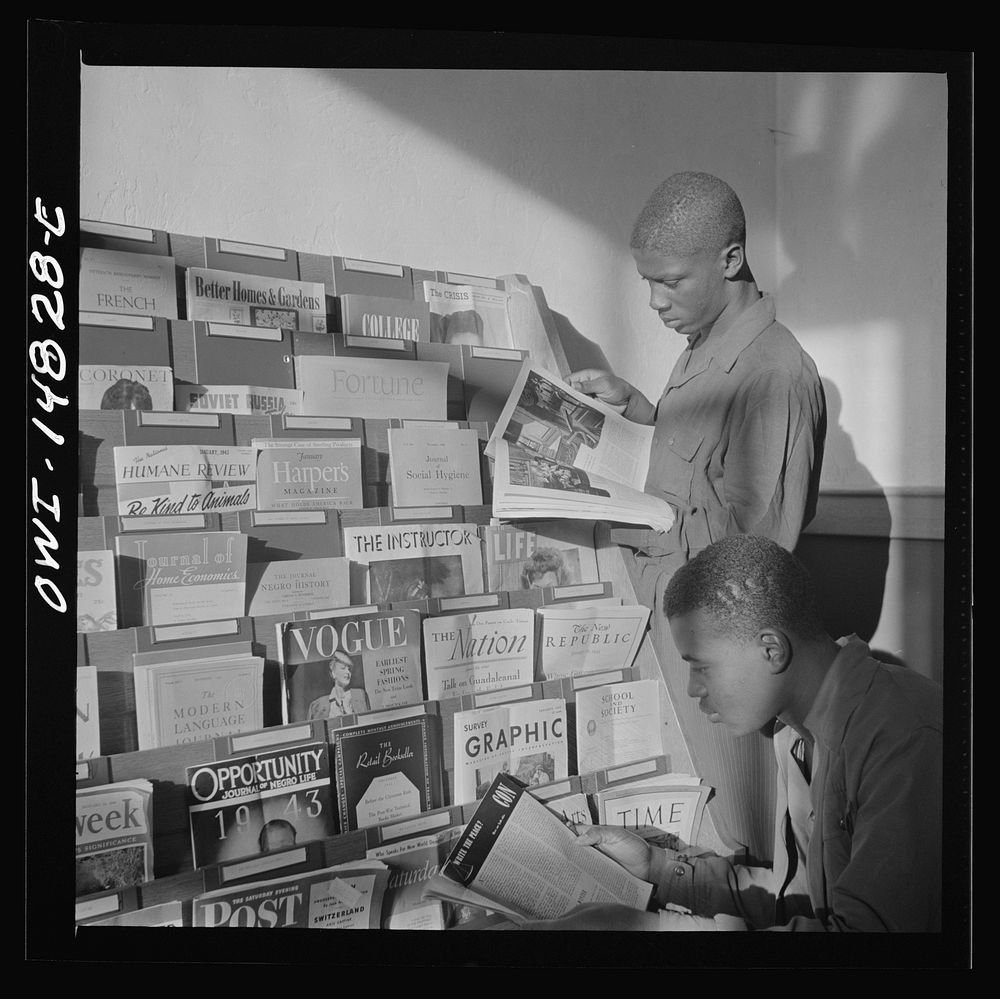 [Untitled photo, possibly related to: Daytona Beach, Florida. Bethune-Cookman College. Students in the library reading…