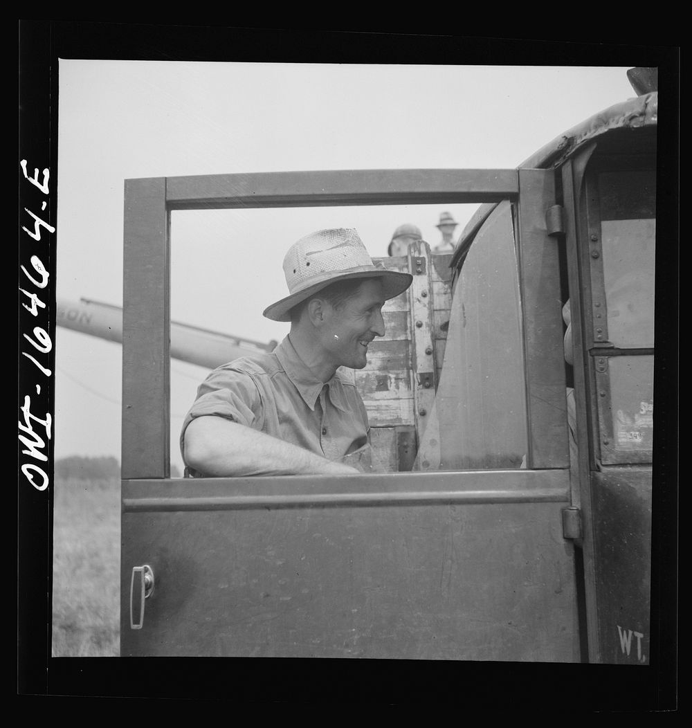 [Untitled photo, possibly related to: Jackson, Michigan. Soldier, who was granted a furlough to help with the harvesting on…