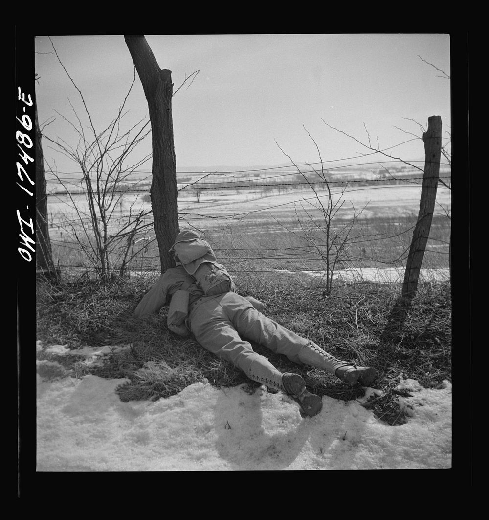 Carlisle, Pennsylvania. U.S. Army medical field service school. Officer candidate who has taken shelter at the side of the…