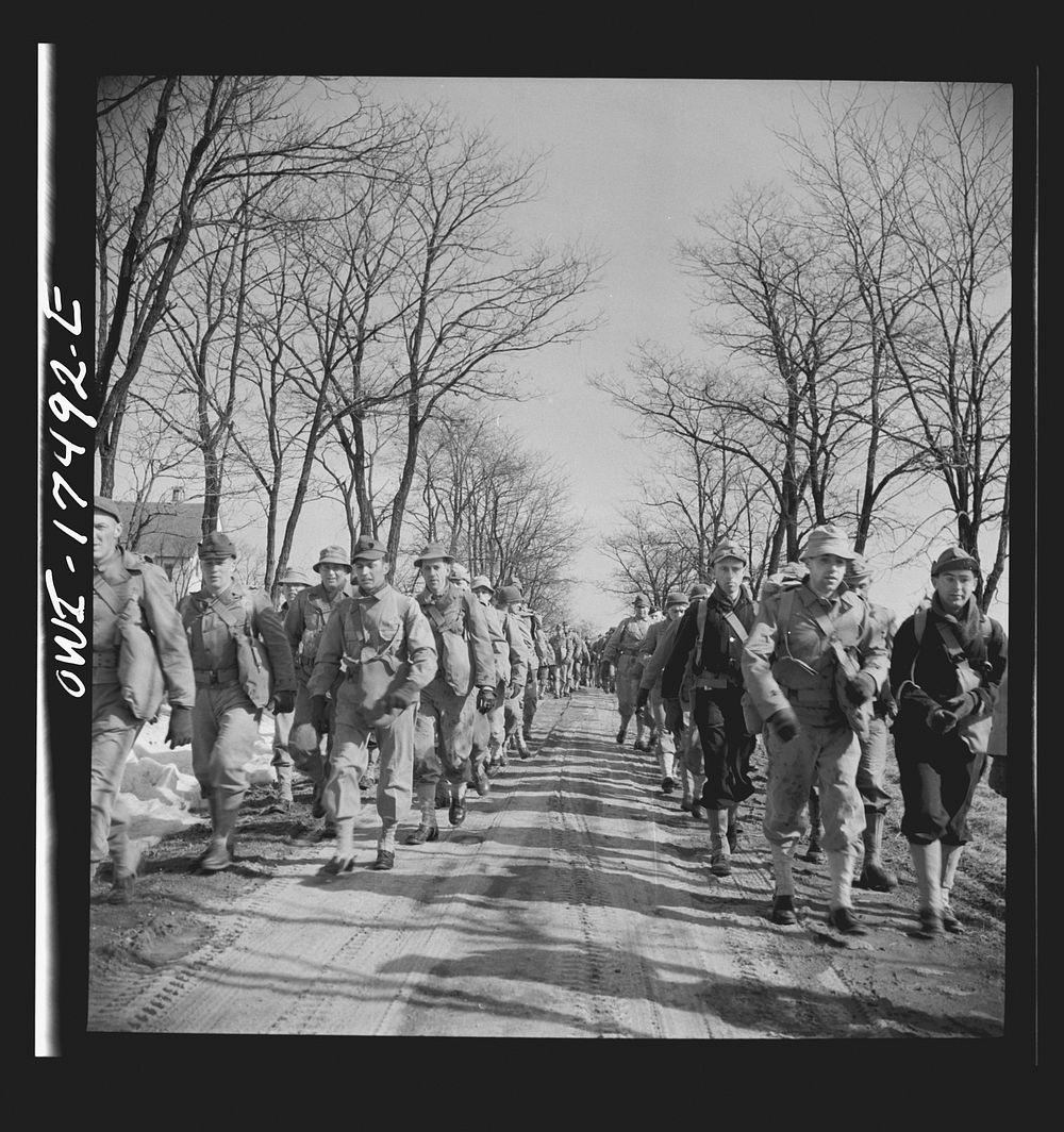 Carlisle, Pennsylvania. U.S. Army medical field service school. Officer candidates on a road march with full packs. Sourced…