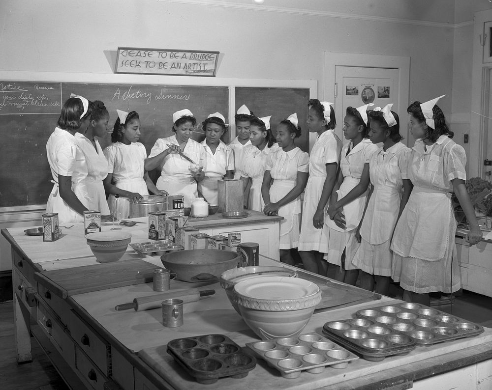 Daytona Beach, Florida. Bethune-Cookman College. Home economic students learning how to make good bread. Sourced from the…