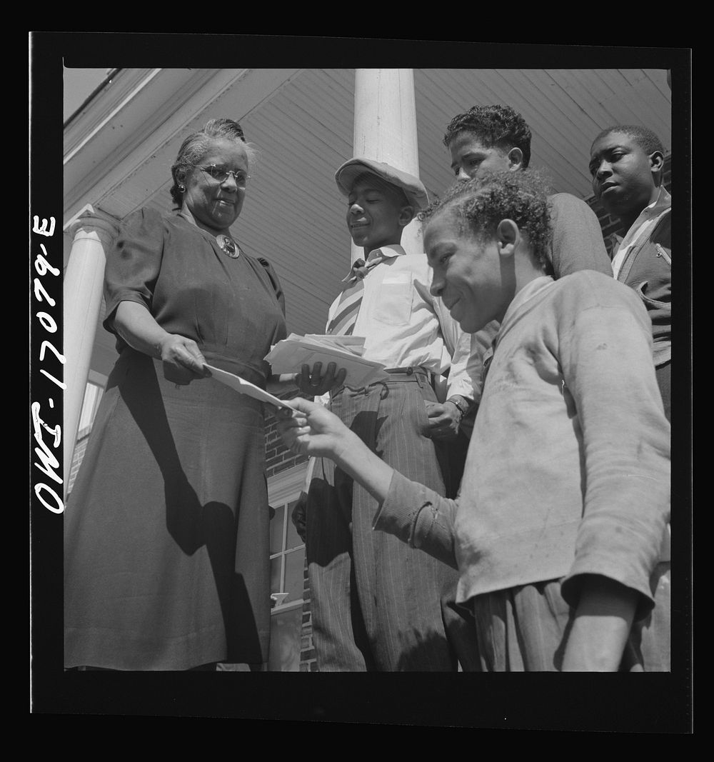 Daytona Beach, Florida. Bethune-Cookman College. Mrs. Shaw handing out mail to college and NYA (National Youth…