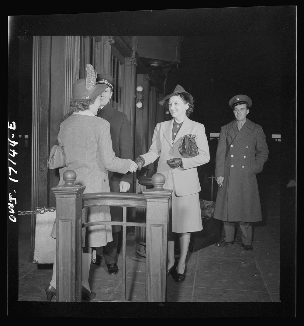[Untitled photo, possibly related to: Wahington, D.C. Mrs. St. Ayr greeting a new girl employee of the U.S. government at…