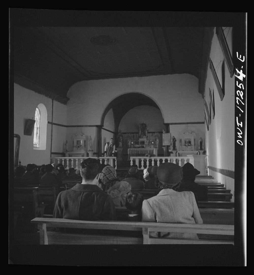 [Untitled photo, possibly related to: Penasco, Taos County, New Mexico. Mass in the village church]. Sourced from the…