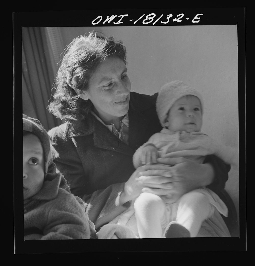 [Untitled photo, possibly related to: Questa, New Mexico. Mother and child, patients at the clinic operated by the Taos…