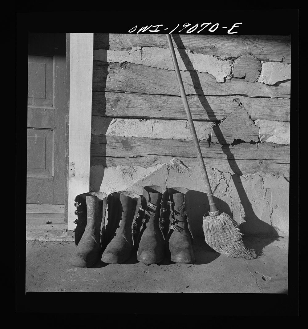 Moreno Valley, Colfax County, New Mexico. Overshoes by the door on George Mutz's ranch. Sourced from the Library of Congress.