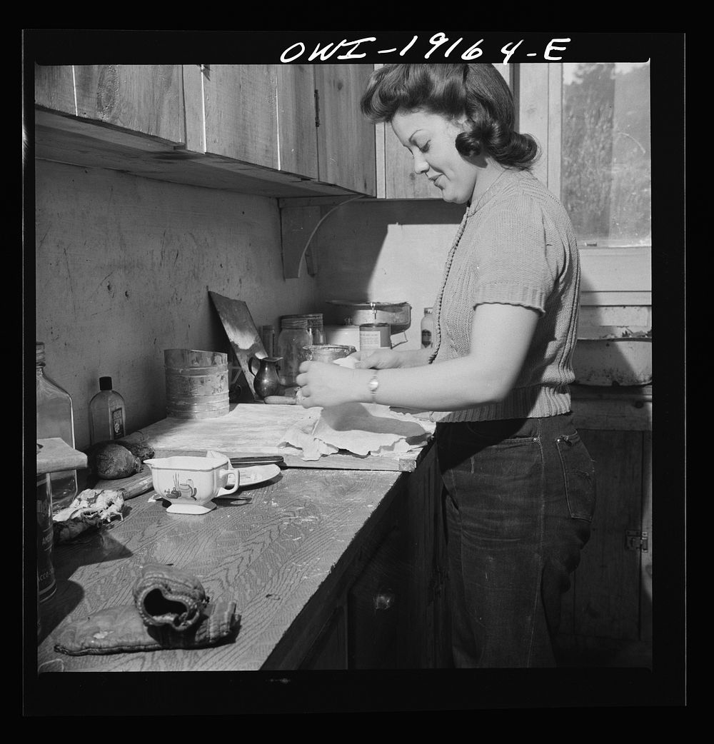 Moreno Valley, Colfax County, New Mexico. Mary Mutz making an apple pie on the Mutz ranch. Sourced from the Library of…