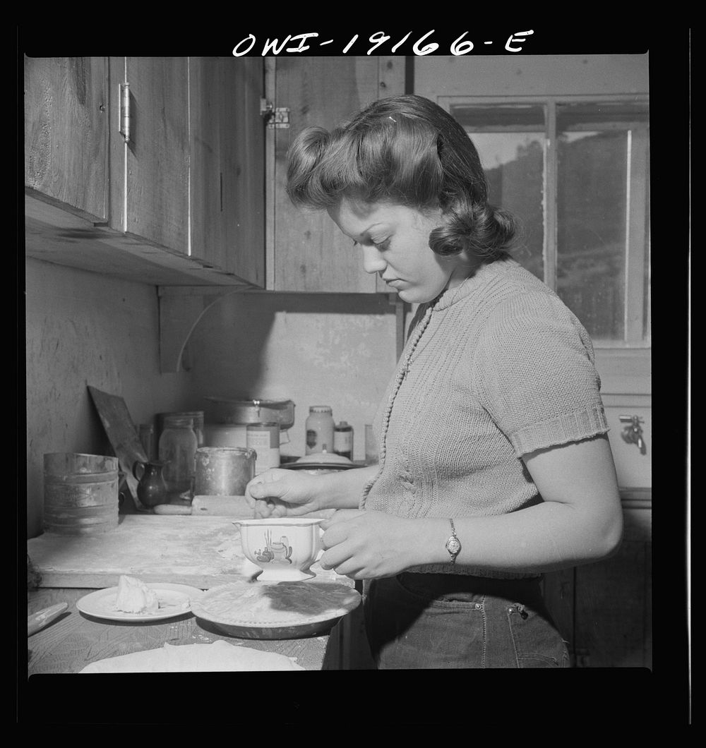 Moreno Valley, Colfax County, New Mexico. Mary Mutz making an apple pie on the Mutz ranch. Sourced from the Library of…