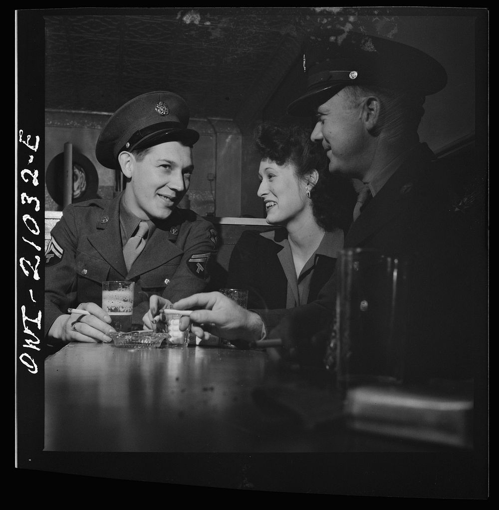 Washington, D.C. Girl who has picked up two soldiers since coming into the Sea Grill alone. They are drinking beer and…
