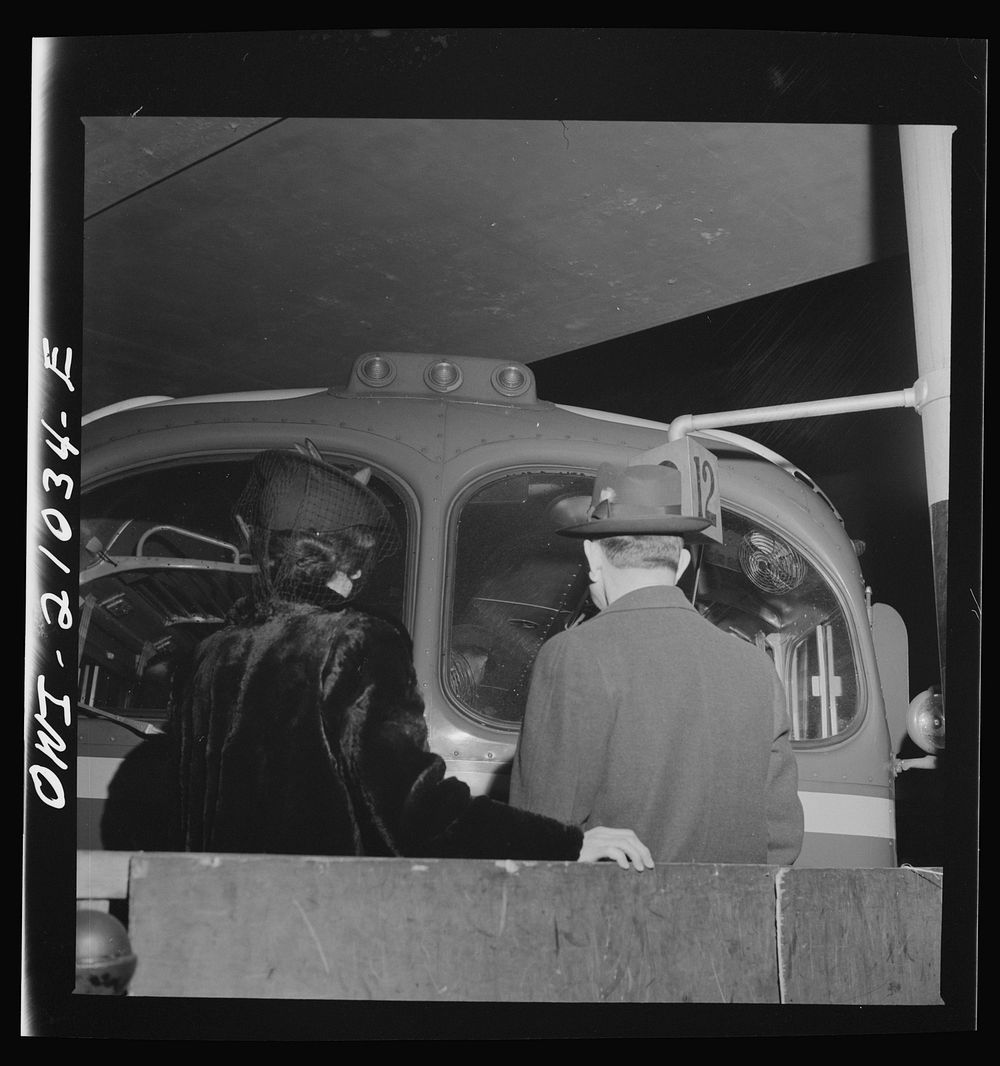 Washington, D.C. Parents of one of the soldiers on a special bus, climbing onto the baggage cart to look into the bus until…