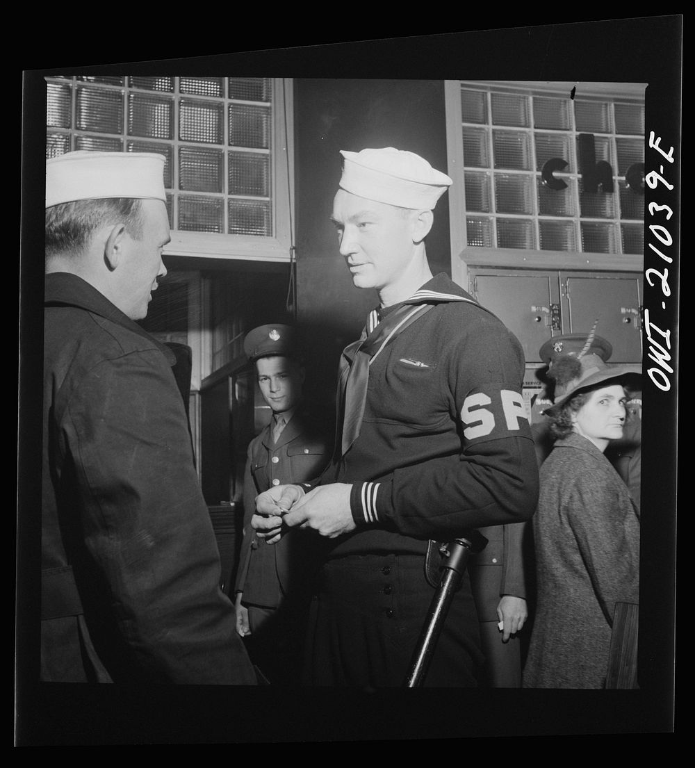 [Untitled photo, possibly related to: Washington, D.C. Member of the Shore Patrol who helps get servicemen lined up and in…