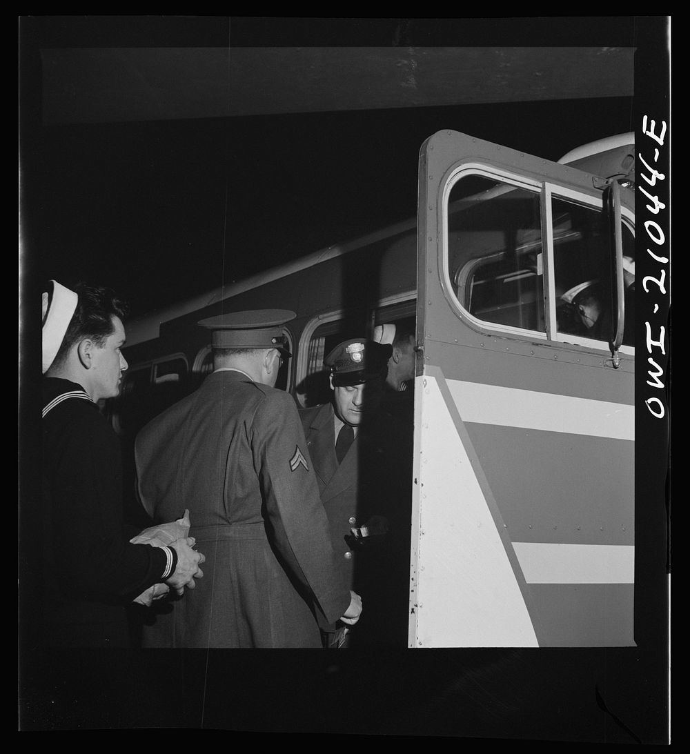 Washington, D.C. Boarding a special bus for servicemen. Leaving the Greyhound terminal on Sunday night. Sourced from the…
