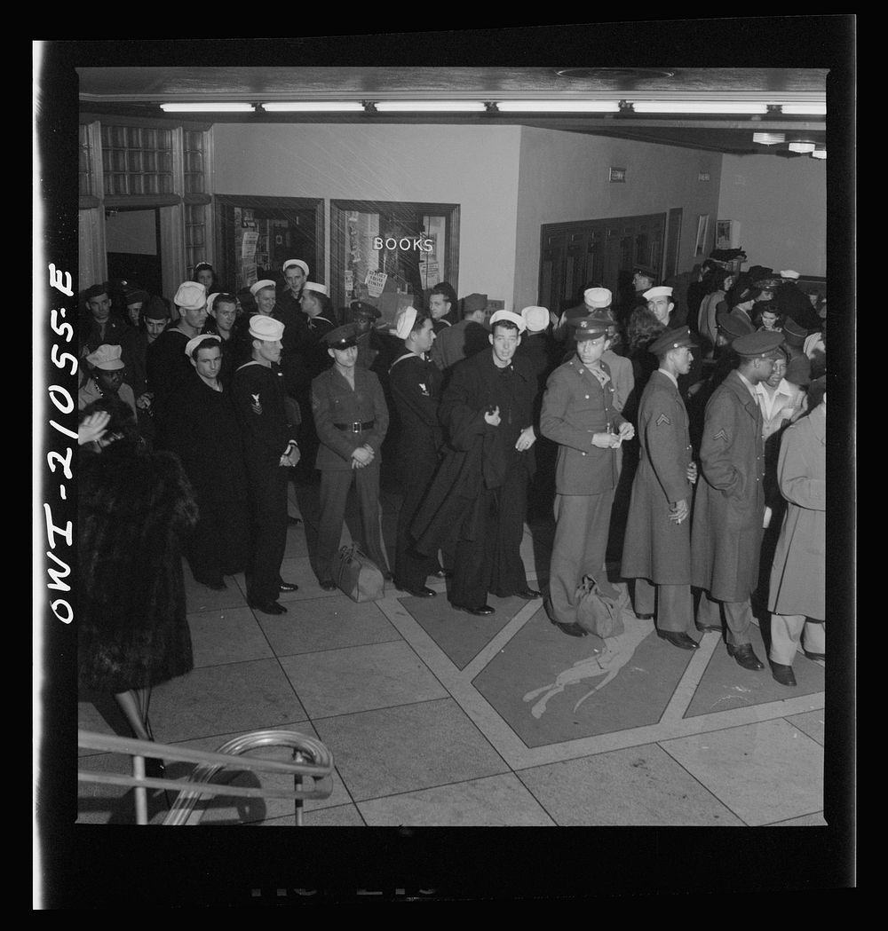 [Untitled photo, possibly related to: Washington, D.C. Waiting in line to board a bus at the Greyhound terminal]. Sourced…