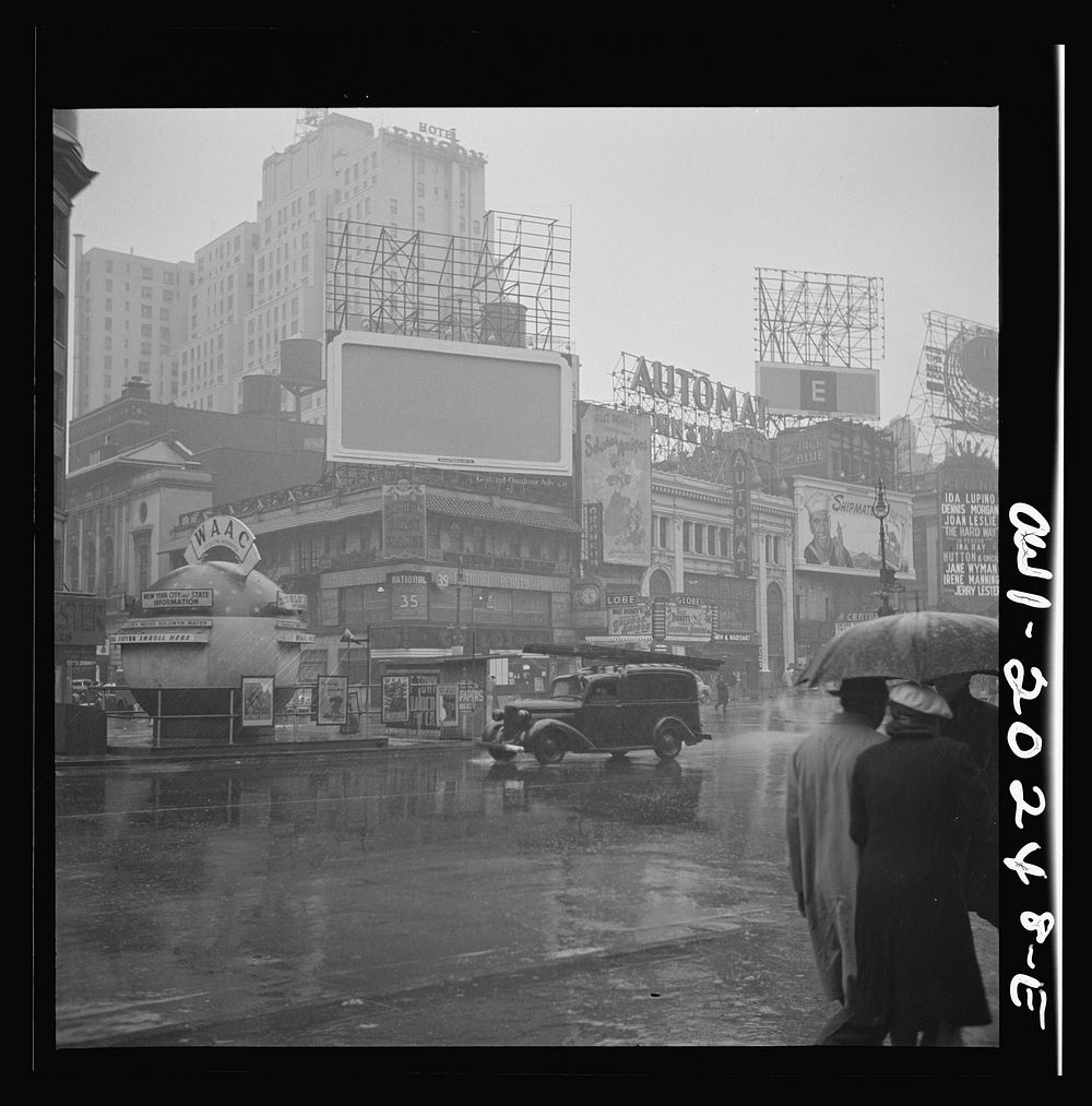 [Untitled photo, possibly related to: New York, New York. Times Square on a rainy day]. Sourced from the Library of Congress.