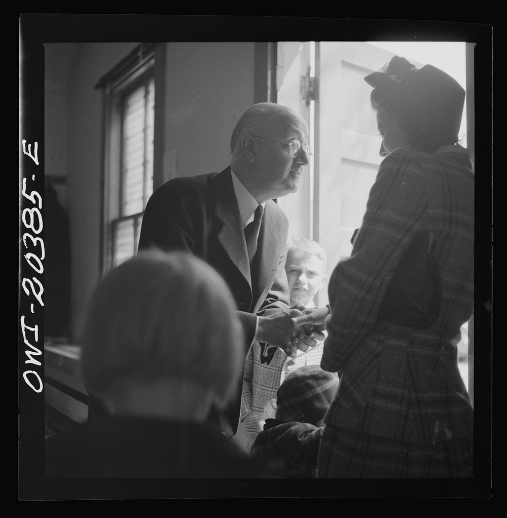 Washington, D.C. Reverend Foot greeting members of his congregation after services at the First Wesleyan Methodist church.…