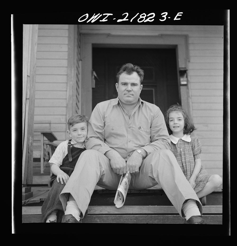 Montgomery, Alabama. Marvin Johnson, truck driver, with his two children. Sourced from the Library of Congress.