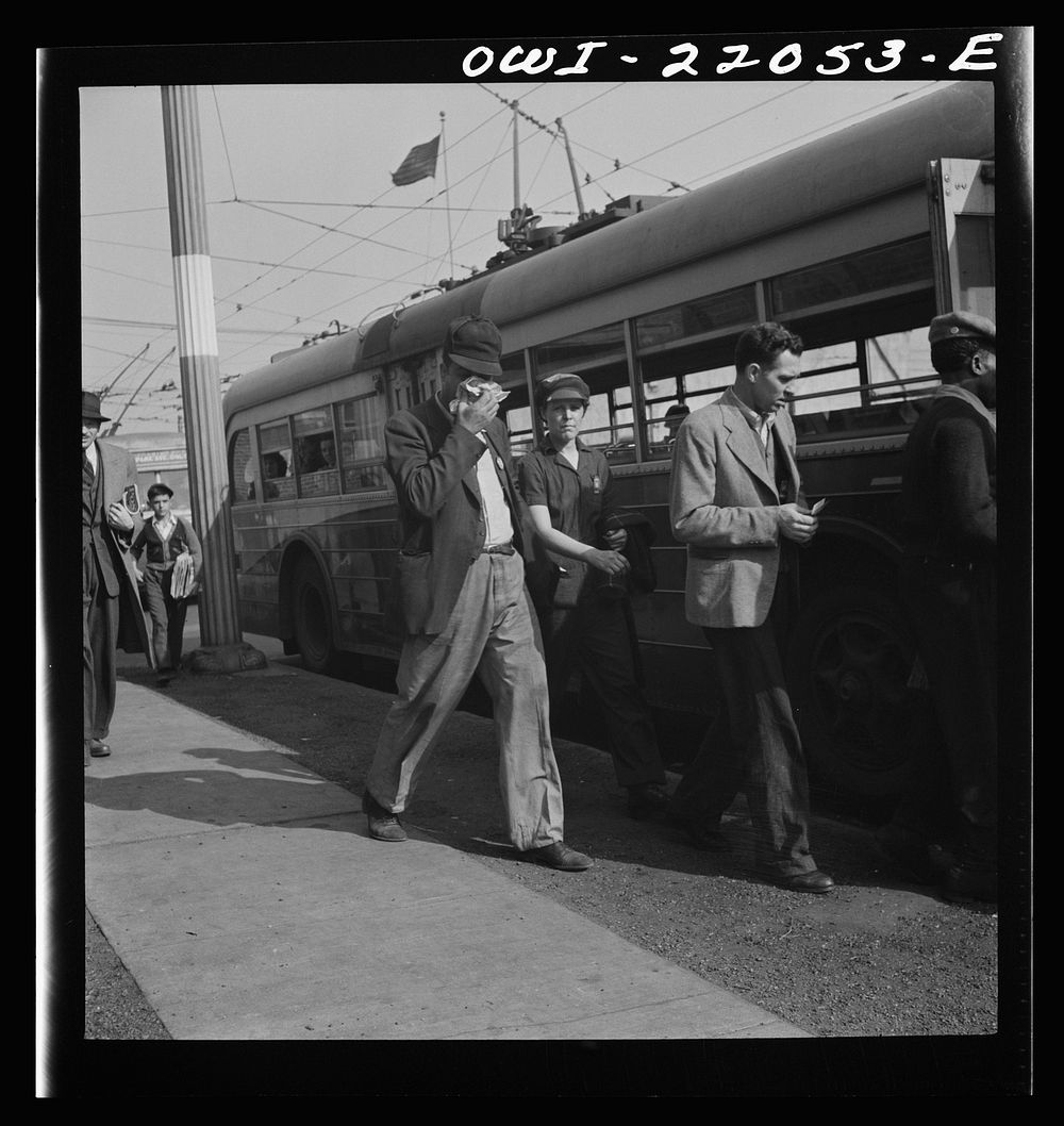 [Untitled photo, possibly related to: Baltimore, Maryland. Workers boarding a trackless trolley at four p.m. Trackless…