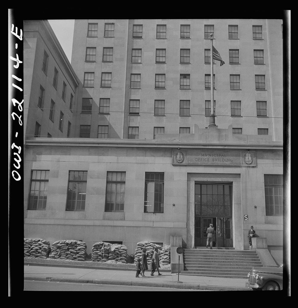 Baltimore, Maryland. Municipal office building, which is prepared for air raids with sand bags. Sourced from the Library of…