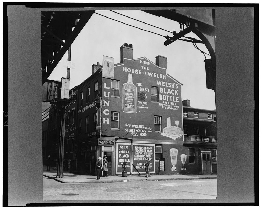Baltimore, Maryland. Restaurant under the elevated trolley. Sourced from the Library of Congress.