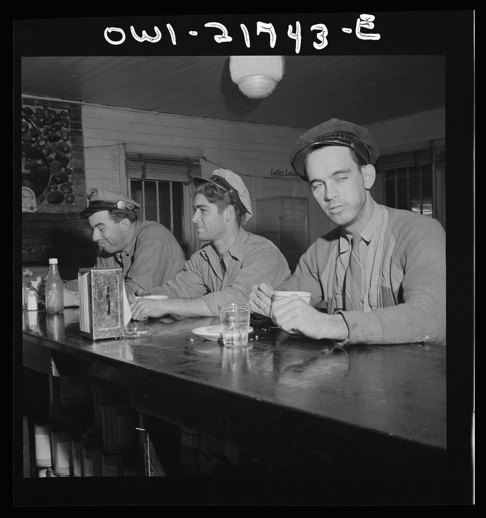 [Untitled photo, possibly related to: Pearlington (vicinity), Mississippi. Truck drivers at a highway coffee stop on U.S.…