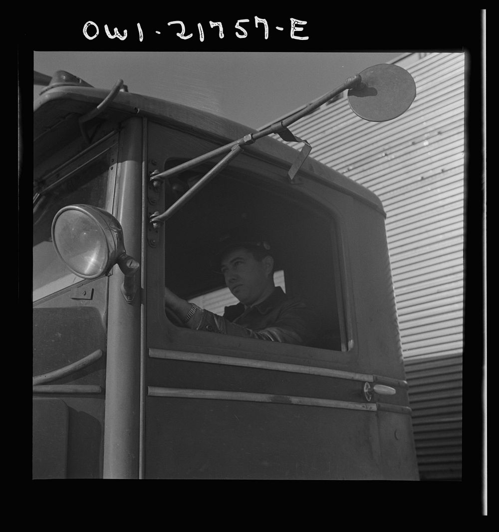 Melvin Cash driving a truck to Charlotte, North Carolina on U.S. Highway 29. Sourced from the Library of Congress.