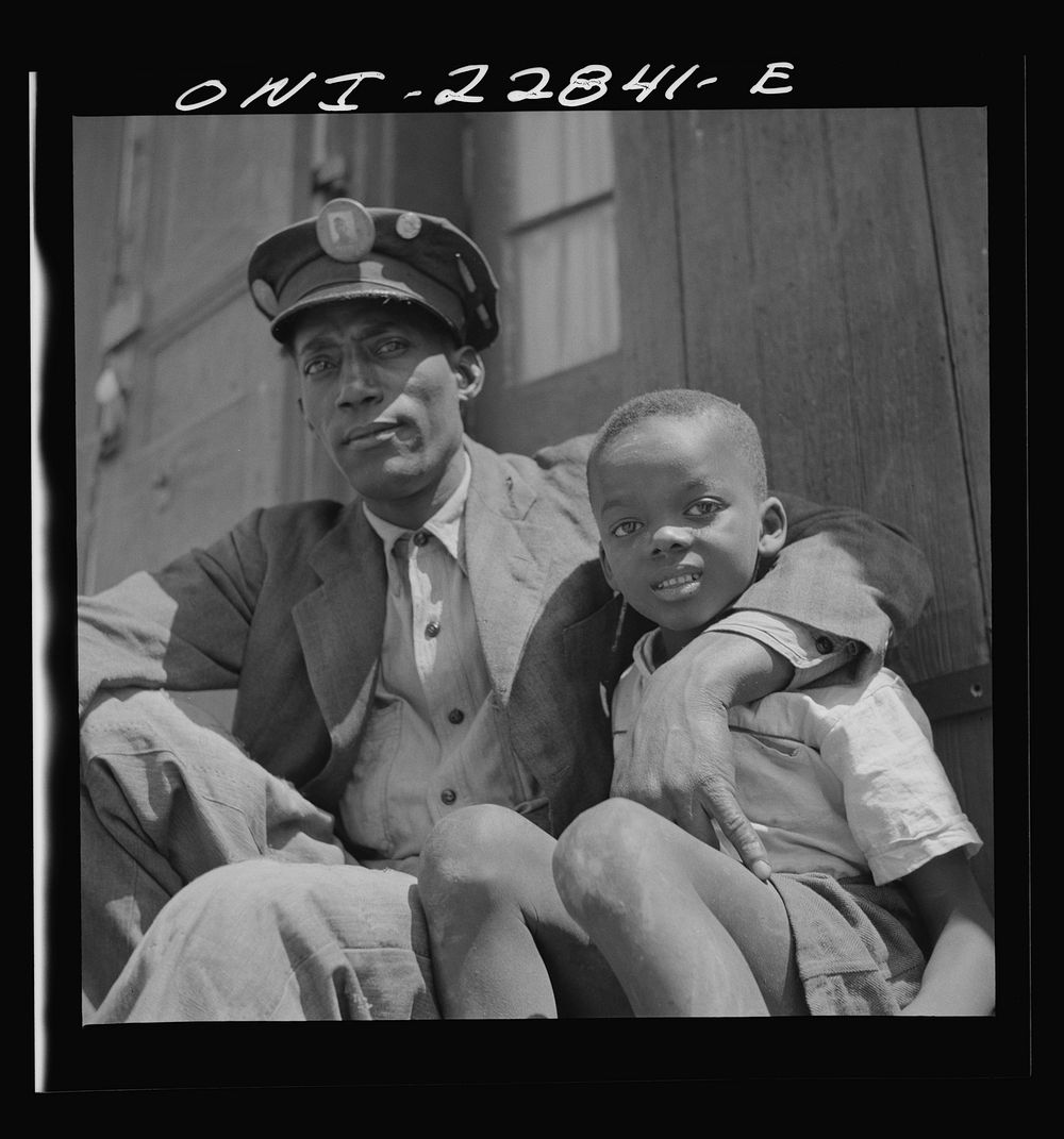 New Orleans, Louisiana.  dock worker and son. Sourced from the Library of Congress.