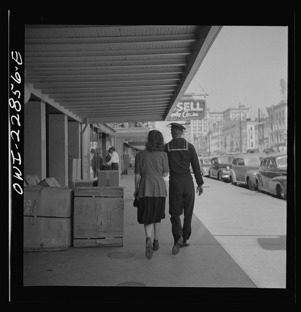 New Orleans, Louisiana. Sailor and girl on Canal Street. Sourced from the Library of Congress.