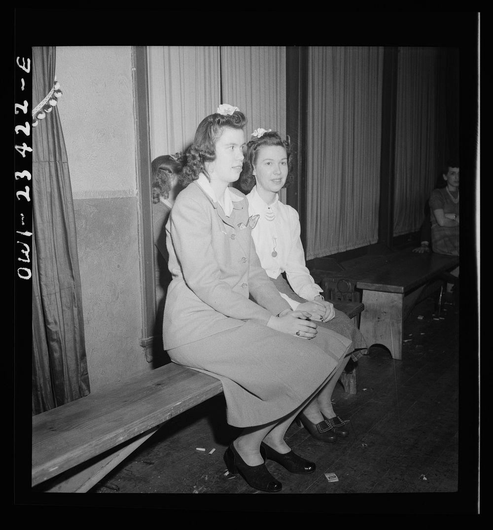 Buffalo, New York. Swingshift workers sitting on the sidelines at the weekly shift dance held from midnight to four a.m. at…