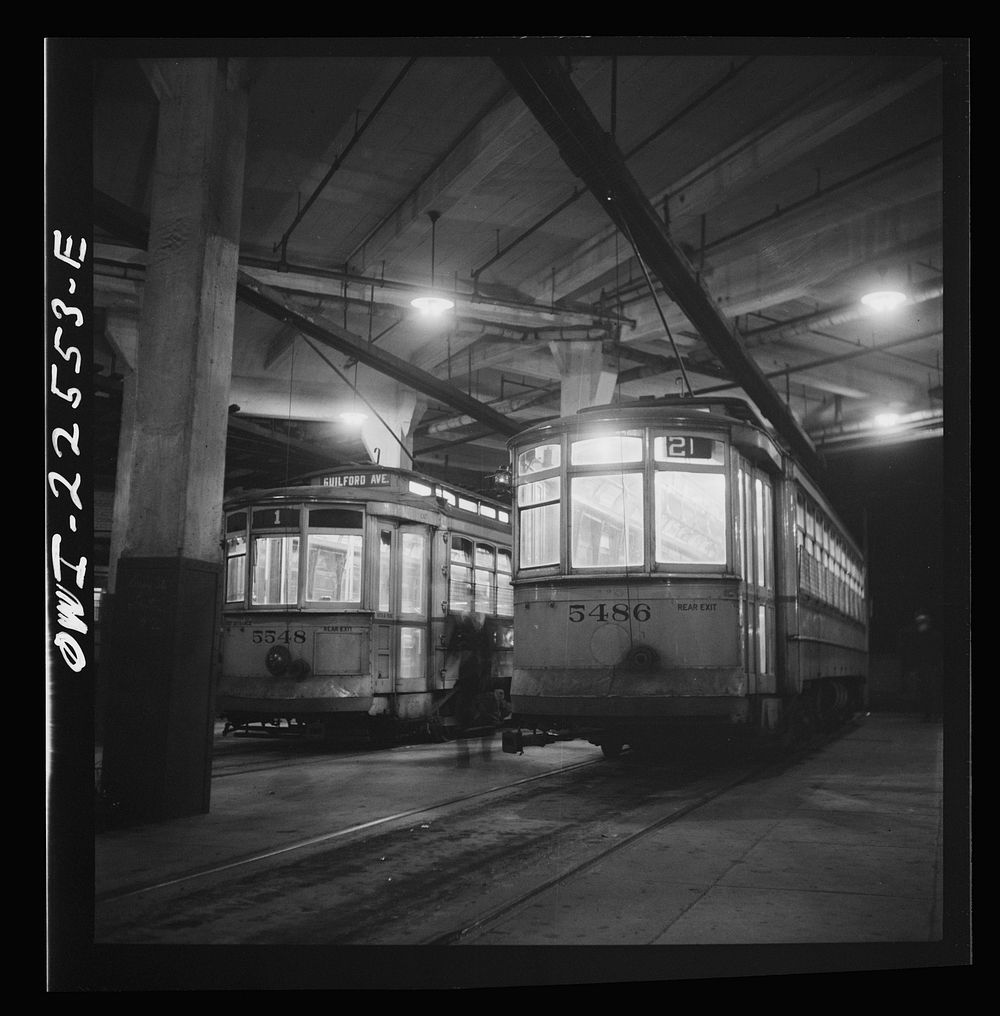 [Untitled photo, possibly related to: Baltimore, Maryland. Trolleys inside the Park terminal at night]. Sourced from the…
