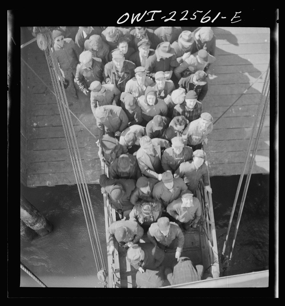 [Untitled photo, possibly related to: Baltimore, Maryland. Bethlehem Fairfield shipyard workers boarding a former Wilson…