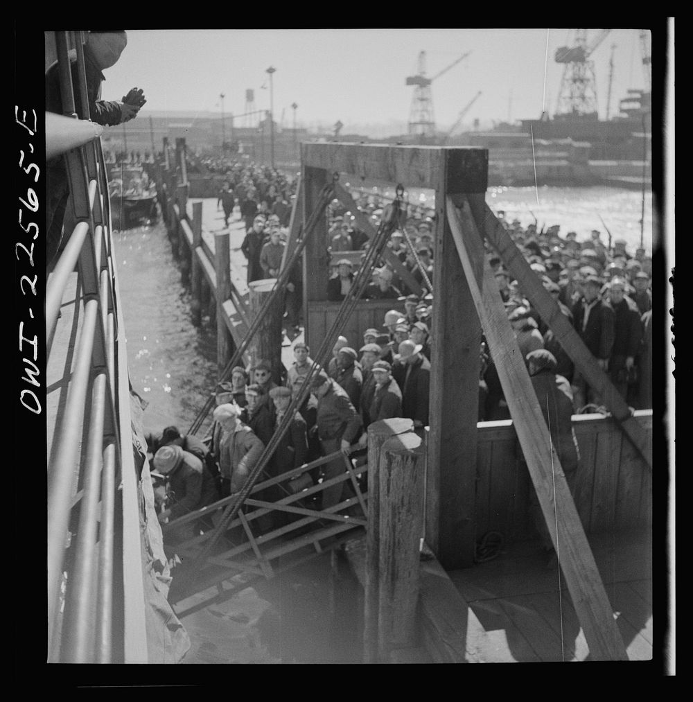 [Untitled photo, possibly related to: Baltimore, Maryland. Bethlehem Fairfield shipyard workers boarding a former Wilson…