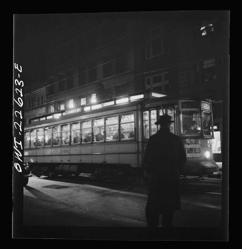 Baltimore, Maryland. Trolley carrying workers to the night shift at the Bethlehem Fairfield shipyard. Sourced from the…
